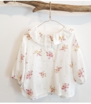 Blusa blanca flor de MIA y LIA